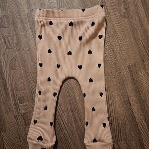 6 to 9 month old Girl Pink Pants with Black hearts. Good condition